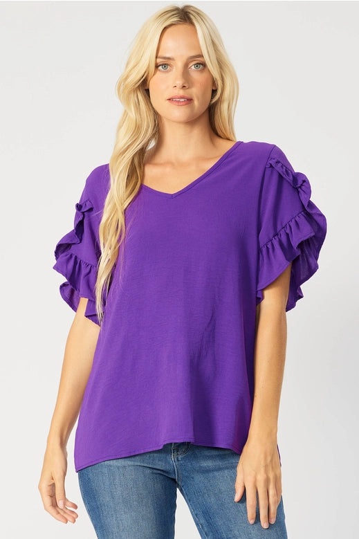 Top - Beautiful V-Neck Air Flow with a Beautiful Ruffled Tulip Sleeve V-Neck. Colors Royal Blue, Vibrant Purple, Neon Orange, Light Blue - Sizes Small to XL