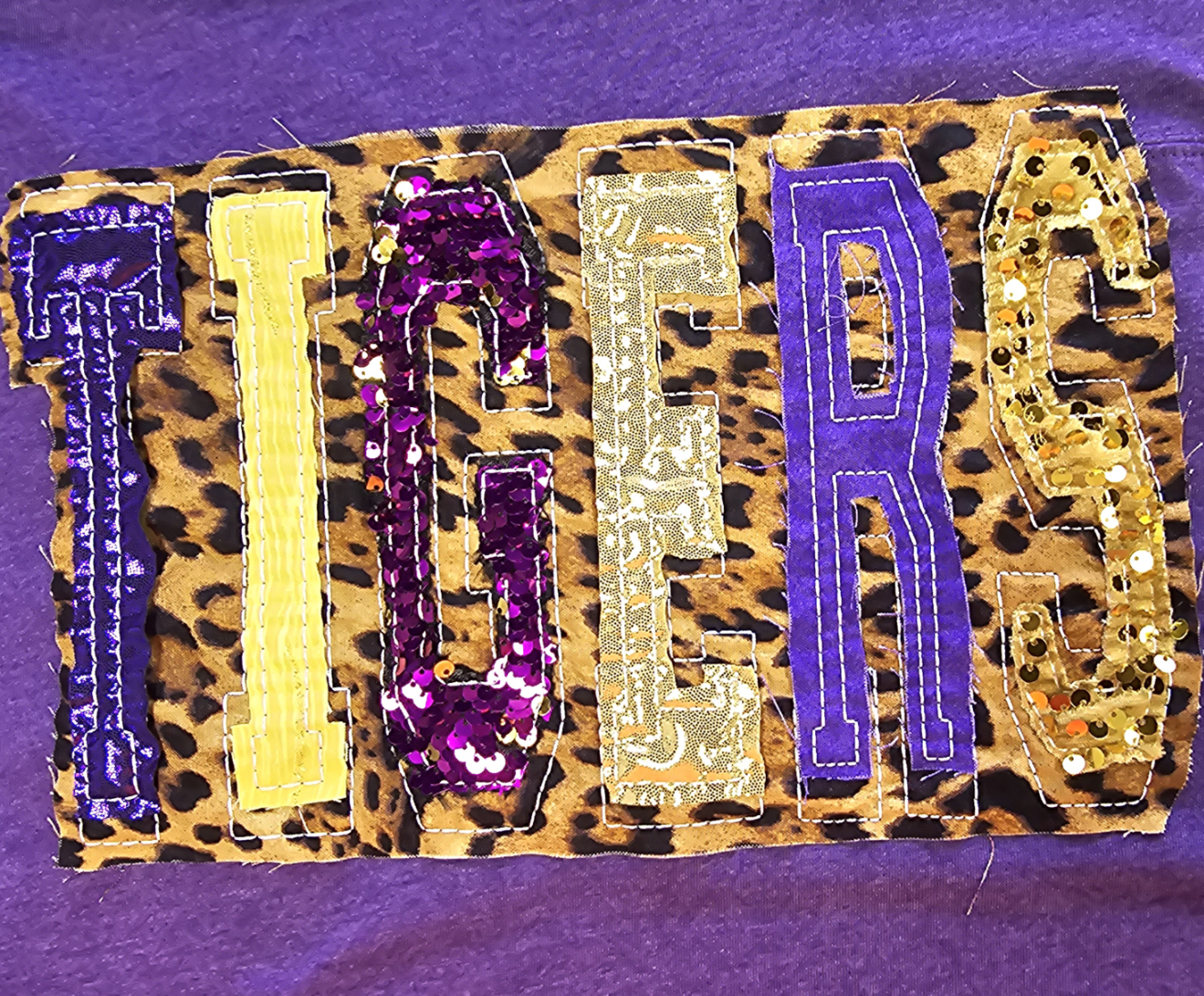 T-Shirts - "TIGERS" Unique Sequin Double Stacked Letters on Purple Heathered Football Styled T-Shirt - Small - 3X